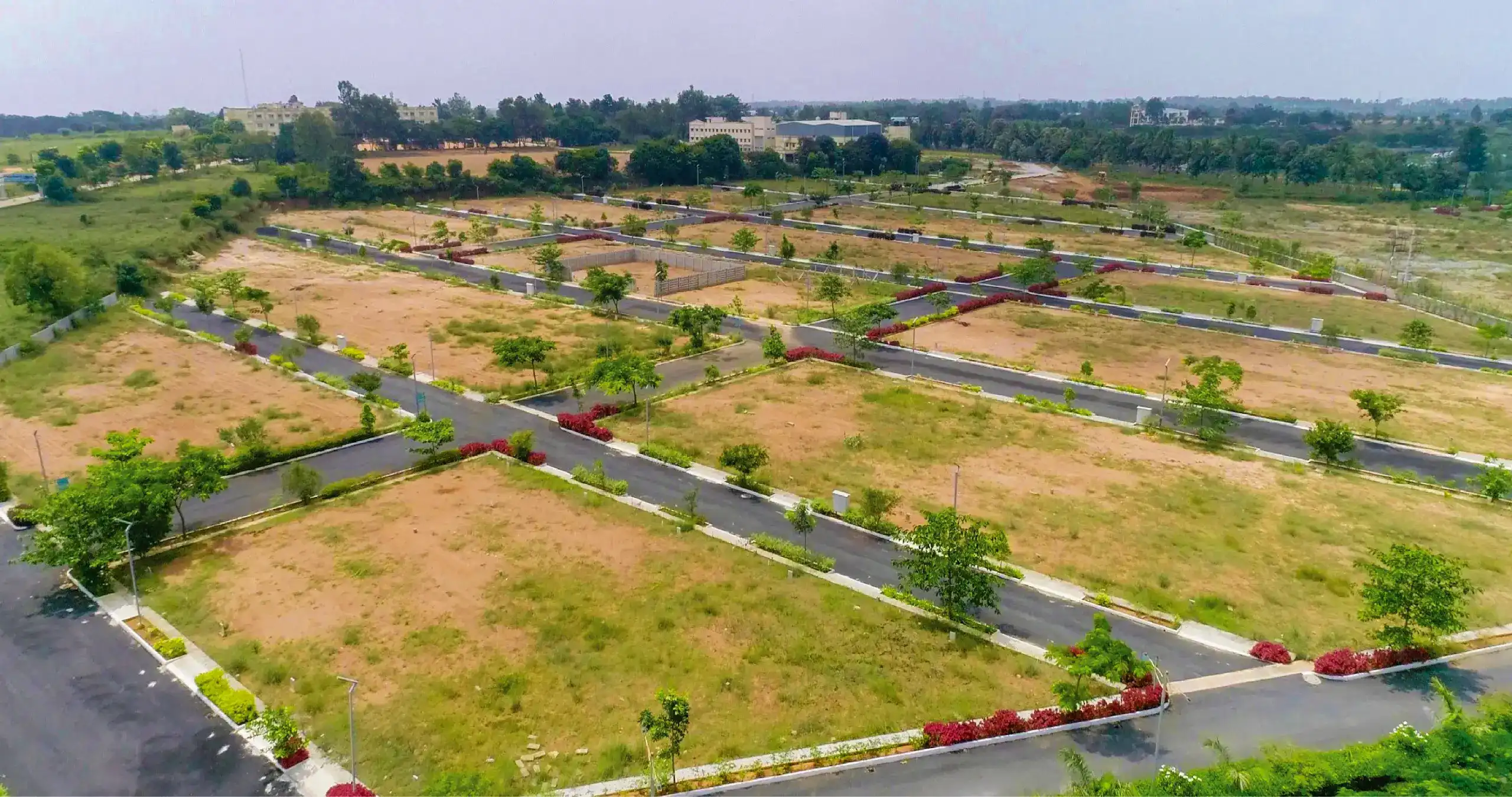 Aerial view of plots for sale in Anekal Bangalore with roads and plotted development